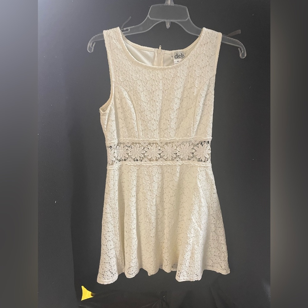 Size medium off white lace dress with cutout design at waist